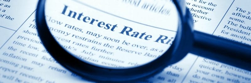 magnifying glass looking at text "Interest Rate"