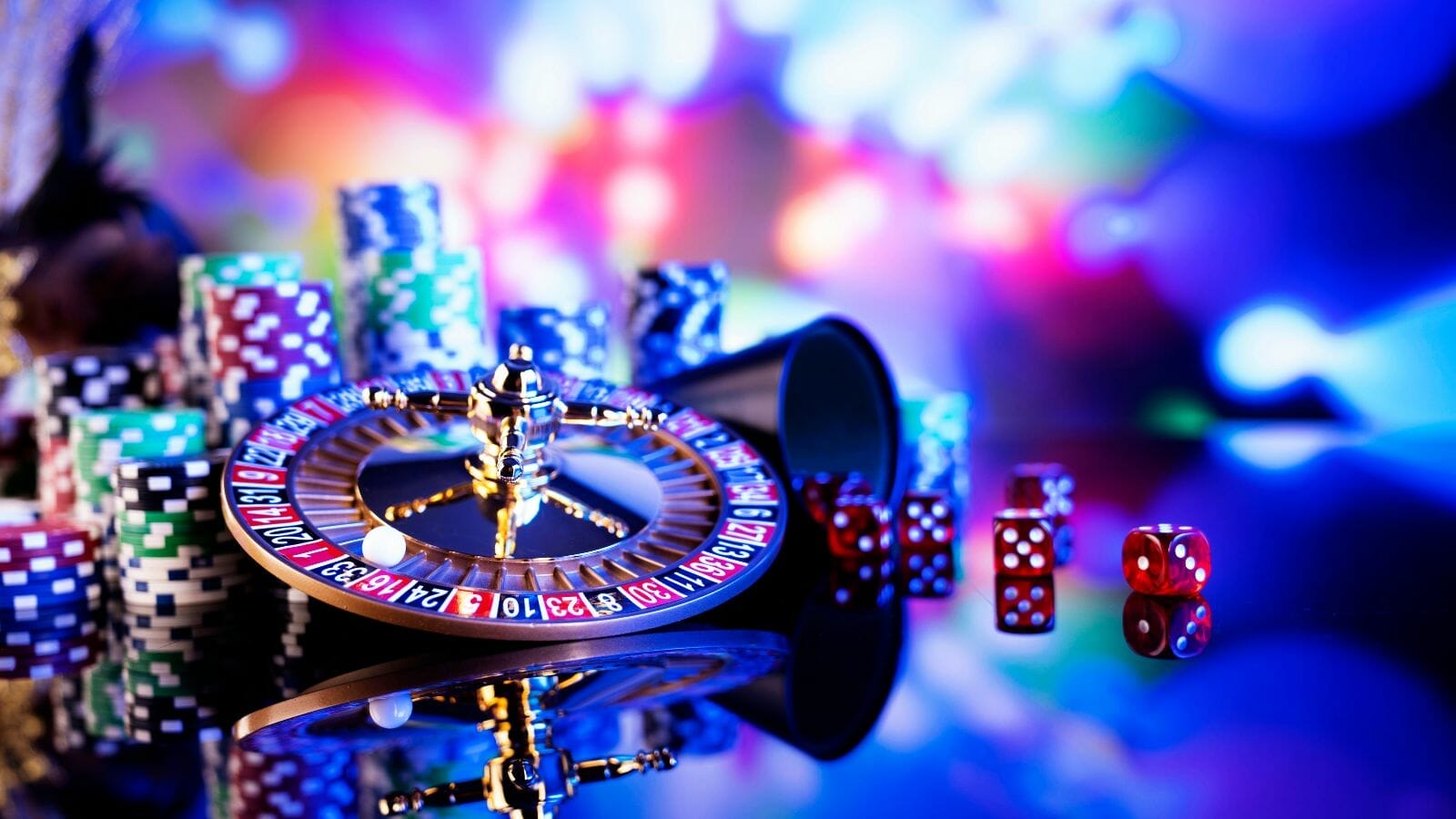 A roulette wheel and dice

