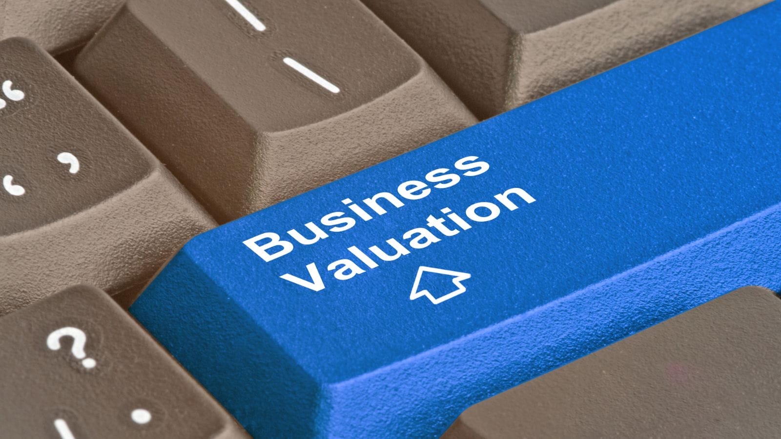 a close-up of keyboard with business valuation on it