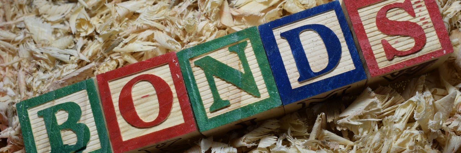 wooden blocks spelling bonds