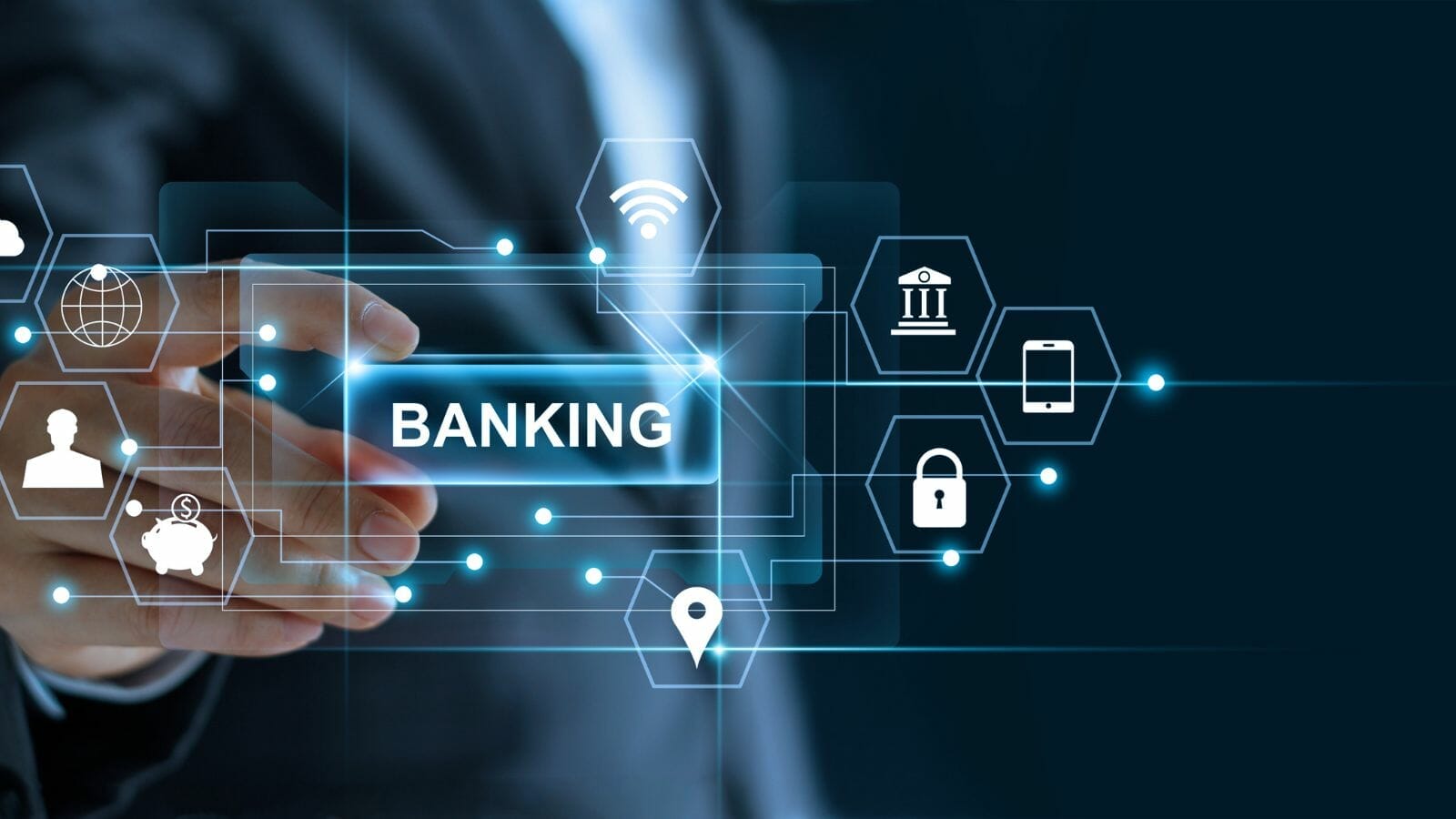 A hand touching a screen with icons saying banking

