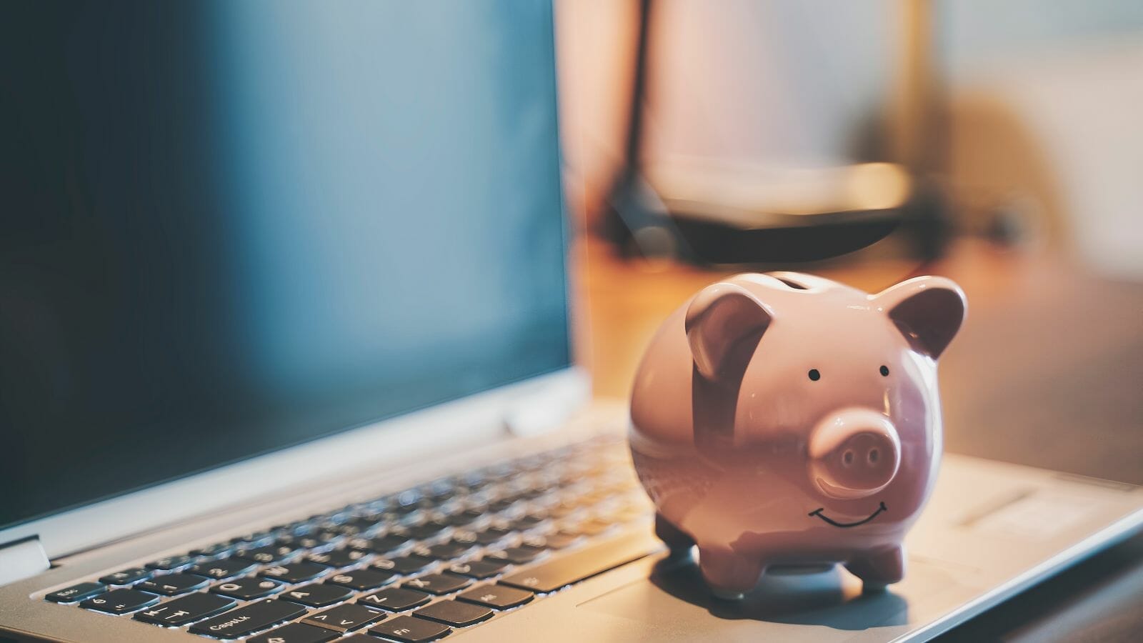 A piggy bank on a computer

