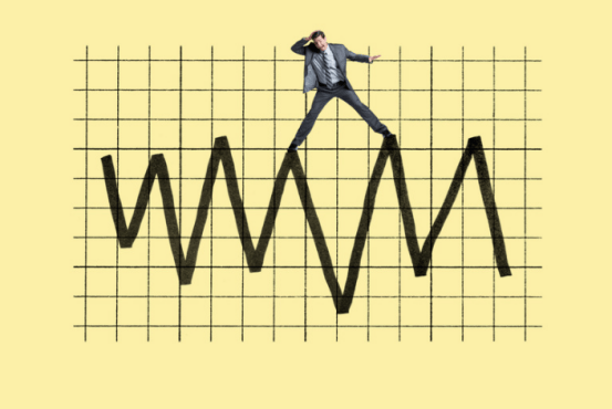 A person standing on a graph
Description automatically generated
