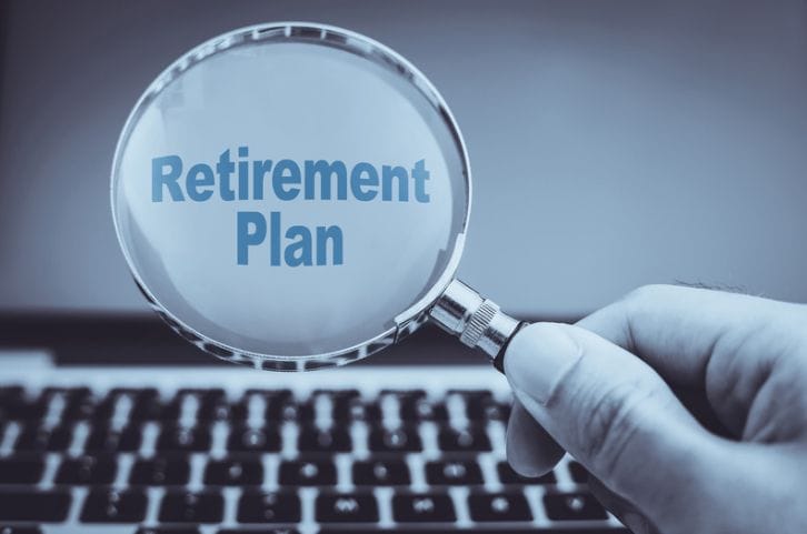 a magnifying glass that says retirement plan