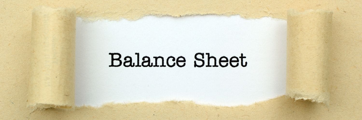 a piece of paper saying "balance sheet"