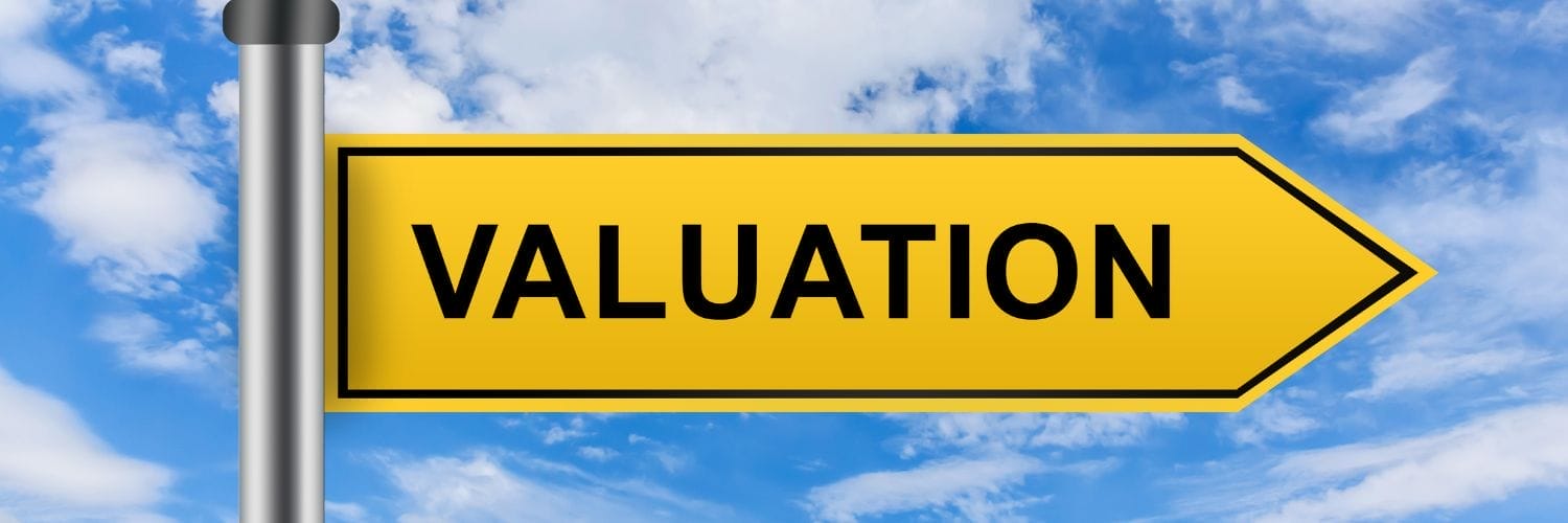 a yellow sign saying valuation