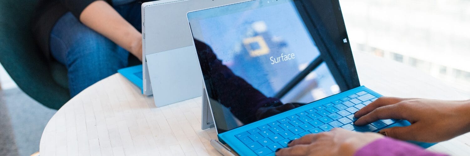 a person using a microsoft surface 