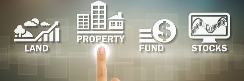 a picture of different assets including land, property, fund, and stocks, with a finger choosing property