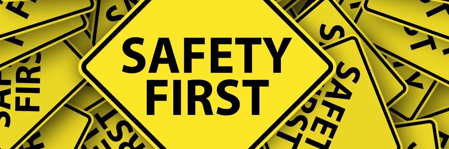 safety first yellow signs