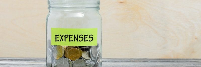 a jar with the word expenses in it