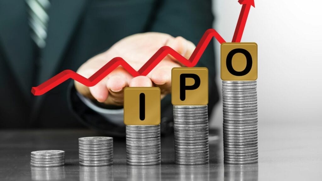 IPO spelled out on stacks of coins with a person holding an upward trending arrow behind it