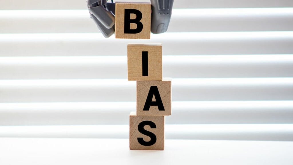 A robot stacking blocks that spell "BIAS"
